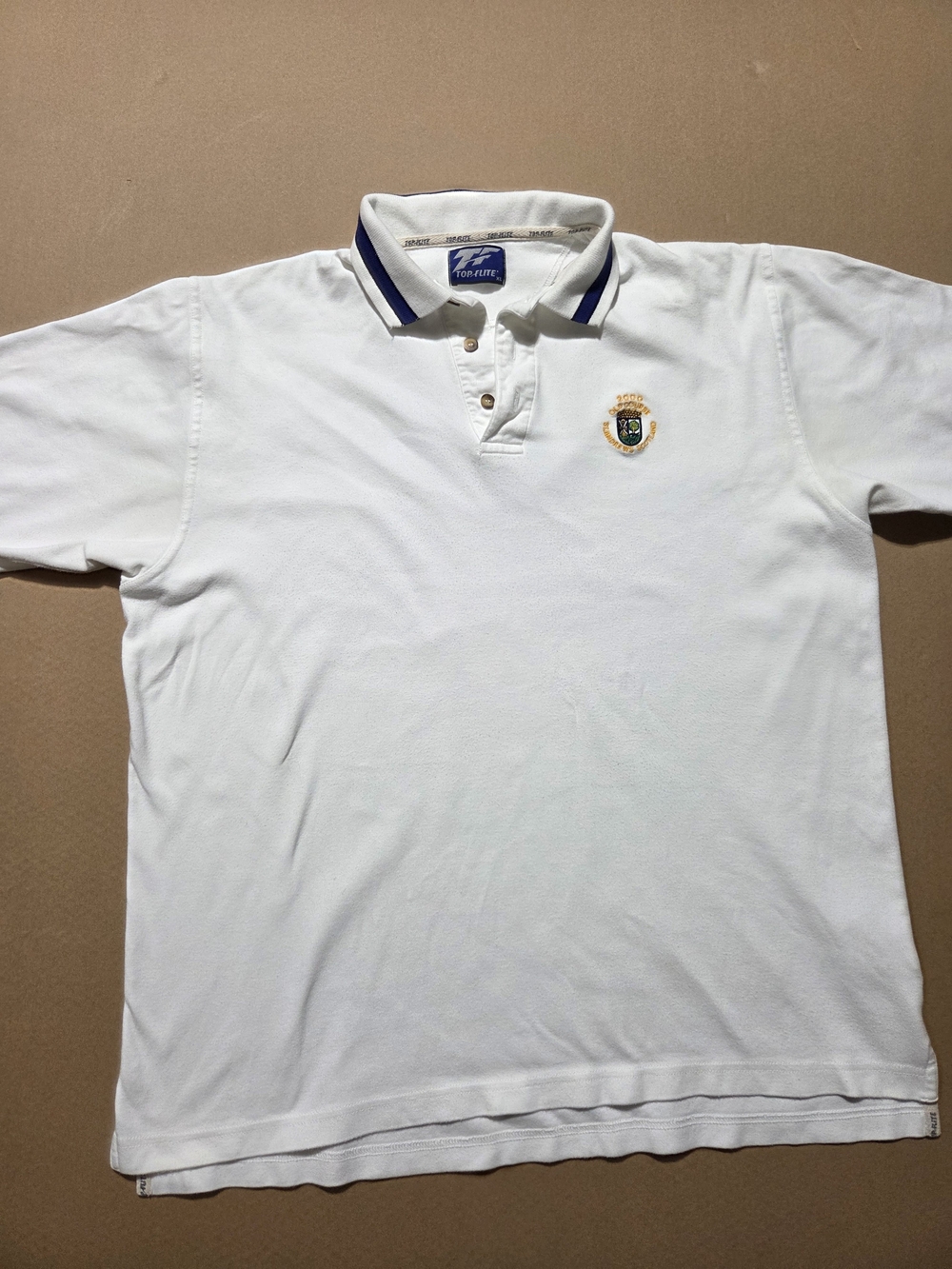 Top Flite white golf polo shirt. 2000 Old Course, St. Andrew's Scotland.